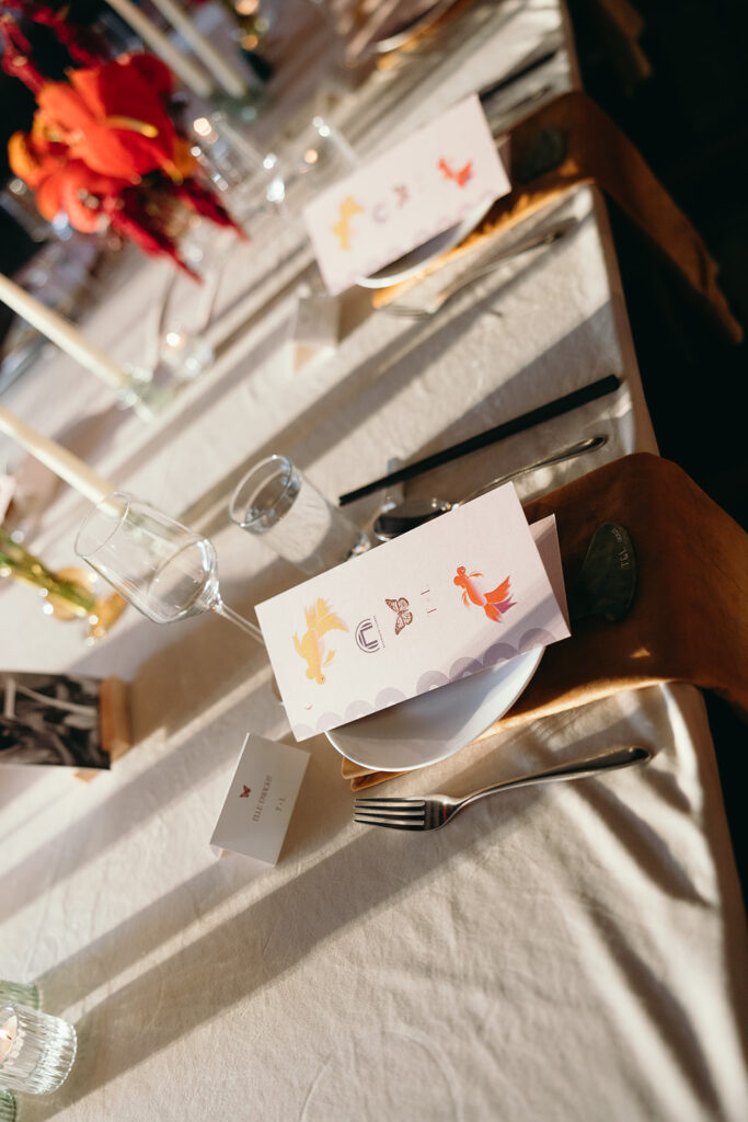 Purple custom wedding menu with symbolic motifs on the fton.