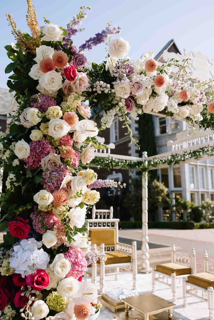 Indian mandap colorful floral arch.