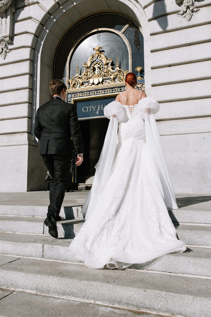 Bride and groom heading into city hall